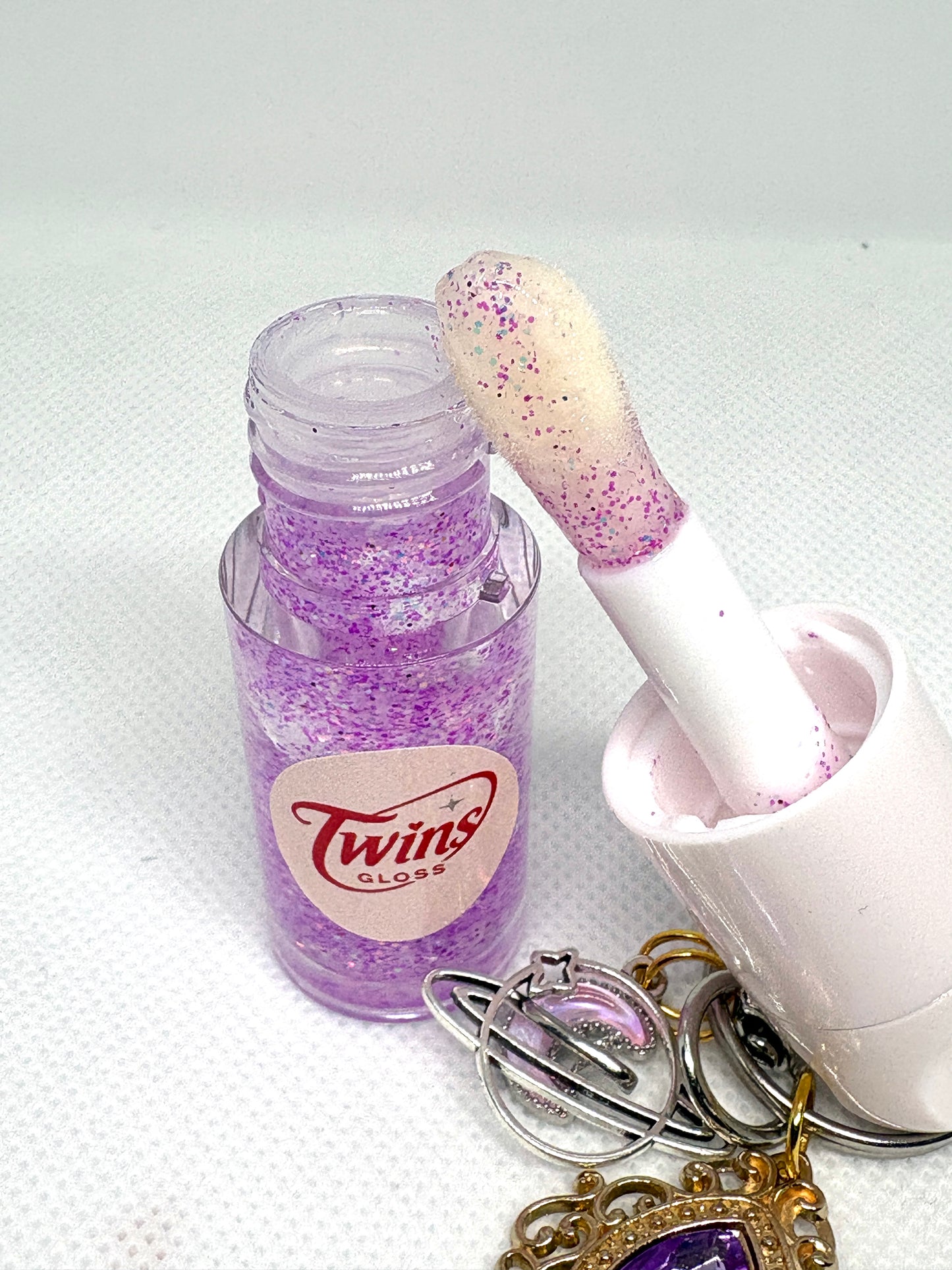 Gloss de géminis  sabor a melón