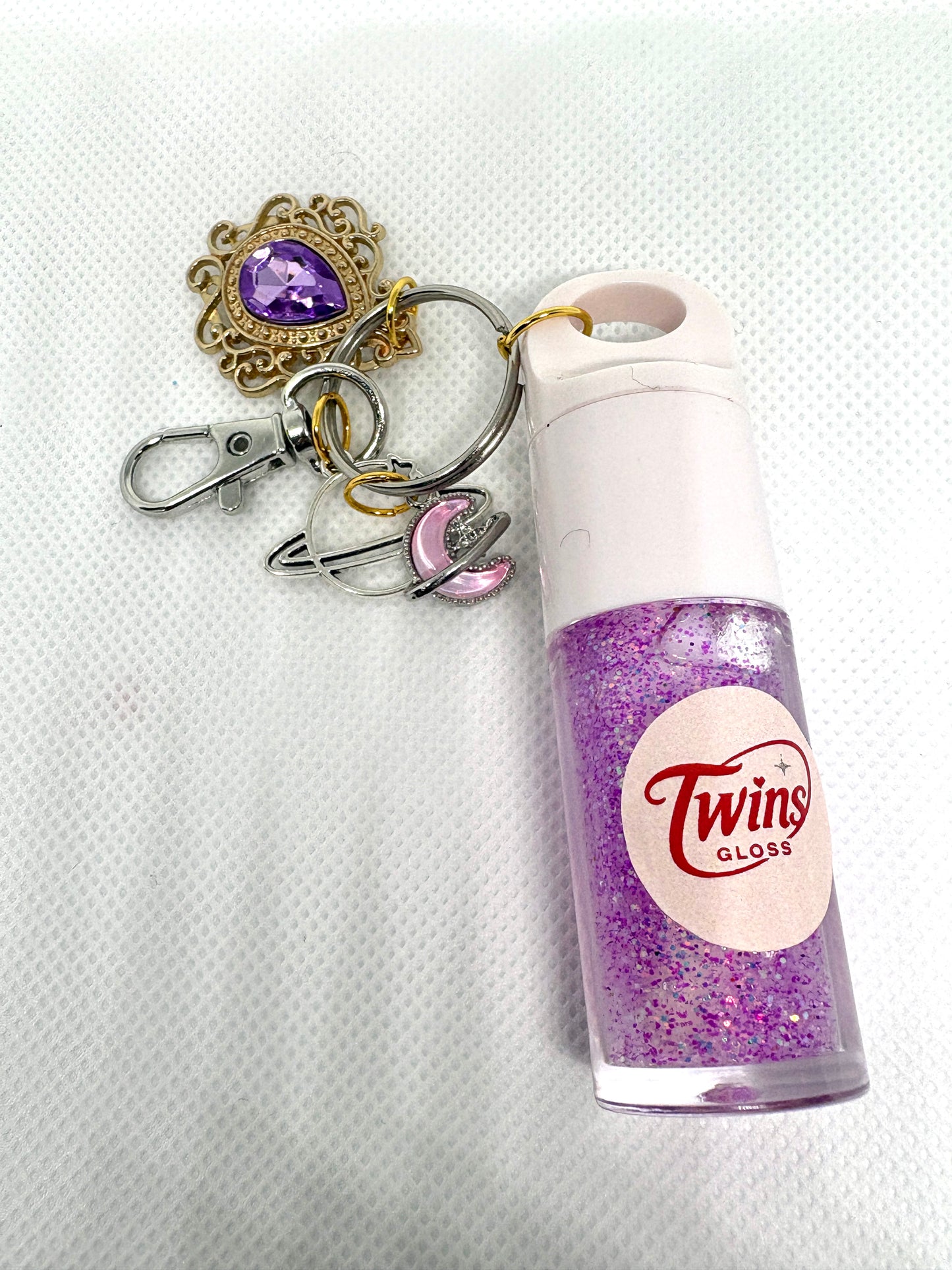 Gloss de géminis  sabor a melón